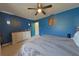 Primary bedroom with king bed and dresser at 2566 Forest Run Ct, Clearwater, FL 33761