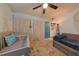 Bedroom with daybed, crib, and laundry access at 2566 Forest Run Ct, Clearwater, FL 33761