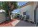 Relaxing patio with seating area and mulch landscaping at 2566 Forest Run Ct, Clearwater, FL 33761