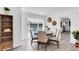 Dining room with round table and chairs, overlooking the pool at 2743 Fountain Pl, Sarasota, FL 34235