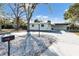 Front view of house with a curved driveway at 2743 Fountain Pl, Sarasota, FL 34235