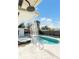 Inviting pool with outdoor shower and lounge chairs at 2743 Fountain Pl, Sarasota, FL 34235