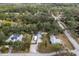 Aerial view of property and surrounding houses at 3200 Tobero Ln, Sarasota, FL 34235