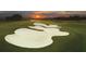 Aerial view of a sand trap at sunset at 3360 Founders Club Dr, Sarasota, FL 34240