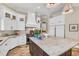 Spacious kitchen with white cabinets, marble countertops, and stainless steel appliances at 3360 Founders Club Dr, Sarasota, FL 34240