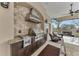 High-end outdoor grill with granite countertop at 3360 Founders Club Dr, Sarasota, FL 34240