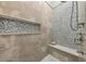 Spa-like shower with a built-in bench and multiple shower heads at 3360 Founders Club Dr, Sarasota, FL 34240