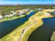 Property location shown from above, near golf course at 3520 Wilderness W Blvd, Parrish, FL 34219