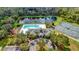 Aerial view of community amenities including pool, tennis courts, and clubhouse at 3520 Wilderness W Blvd, Parrish, FL 34219