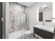 Contemporary bathroom with a walk-in shower, floating vanity, and modern tile at 3520 Wilderness W Blvd, Parrish, FL 34219