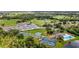 Tennis courts, clubhouse, and pool in community at 3520 Wilderness W Blvd, Parrish, FL 34219