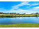 Peaceful water view of the golf course and lake at 3520 Wilderness W Blvd, Parrish, FL 34219