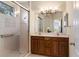 Bathroom with double vanity and walk-in shower at 4104 Reflections Pkwy, Sarasota, FL 34233