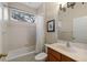 Clean bathroom with tub, toilet, and vanity at 4104 Reflections Pkwy, Sarasota, FL 34233