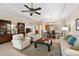 Open living space with a view into the kitchen and dining area at 4104 Reflections Pkwy, Sarasota, FL 34233