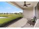 Spacious screened porch with pond view at 4104 Reflections Pkwy, Sarasota, FL 34233