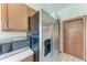 Stainless steel refrigerator and microwave in kitchen at 4410 70Th E Dr, Sarasota, FL 34243