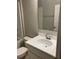 Clean bathroom featuring a bright white vanity and a toilet at 4432 Collingswood Blvd, Port Charlotte, FL 33948