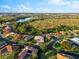 Aerial view of community, showcasing homes and landscape at 4941 Bridgehampton Blvd, Sarasota, FL 34238