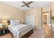 Charming bedroom featuring a double bed, dresser, and built-in closet at 4941 Bridgehampton Blvd, Sarasota, FL 34238