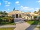 Beautiful home with tile roof and landscaping at 4941 Bridgehampton Blvd, Sarasota, FL 34238