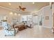 Living room boasting ample natural light, comfortable seating, and views of the entryway at 4941 Bridgehampton Blvd, Sarasota, FL 34238