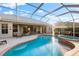 Enjoy this relaxing pool and spa, screened and private at 4941 Bridgehampton Blvd, Sarasota, FL 34238