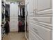 Large walk-in closet with ample shelving and drawers at 5233 Blossom Cv, Lakewood Ranch, FL 34211