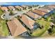 Aerial view of homes with tile roofs in a community at 5255 Cicerone St, Sarasota, FL 34238