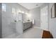 Spa-like bathroom with double sinks, a large walk-in shower, and modern fixtures at 5255 Cicerone St, Sarasota, FL 34238