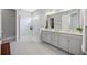 Elegant bathroom with double vanity, large shower, and marble finishes at 5255 Cicerone St, Sarasota, FL 34238