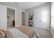 Bright bedroom with ensuite bathroom access and double closets at 5255 Cicerone St, Sarasota, FL 34238