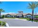 Community clubhouse with palm trees and landscaping at 5255 Cicerone St, Sarasota, FL 34238