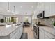 Bright kitchen features stainless steel appliances and an island at 5255 Cicerone St, Sarasota, FL 34238