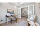 Home office with built-in desk and French doors at 5255 Cicerone St, Sarasota, FL 34238