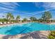 Inviting pool with lap lanes, ample seating, and umbrellas at 5255 Cicerone St, Sarasota, FL 34238