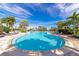 Expansive resort-style pool with luxurious lounge areas at 5255 Cicerone St, Sarasota, FL 34238