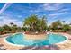 Circular pool with a central island and lounge chairs at 5255 Cicerone St, Sarasota, FL 34238