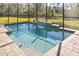 Inviting swimming pool with waterfall feature at 5255 Cicerone St, Sarasota, FL 34238