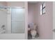 Clean bathroom with shower/tub combo and toilet at 5504 Birchwood Rd, Spring Hill, FL 34608