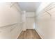 Large walk-in closet with wire shelving at 6009 Bonaventure Pl, Sarasota, FL 34243