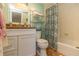 Bathroom with tub, shower, and granite vanity at 6200 Flotilla Dr # 241, Holmes Beach, FL 34217