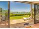 Relaxing patio with lounge chair and view of the water at 6200 Flotilla Dr # 241, Holmes Beach, FL 34217