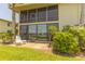 Private patio with water views and seating at 6200 Flotilla Dr # 241, Holmes Beach, FL 34217