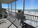 Spacious balcony overlooking beach and ocean at 6312 Midnight Pass Rd # 301S, Sarasota, FL 34242