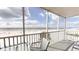 Scenic balcony view of beach and ocean at 6312 Midnight Pass Rd # 301S, Sarasota, FL 34242