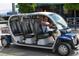 Siesta Key Free Ride six-passenger electric vehicle at 6312 Midnight Pass Rd # 301S, Sarasota, FL 34242