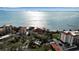 Aerial view of waterfront villas with red roofs surrounded by beautiful blue water at 6442 Mourning Dove Dr # 6442, Bradenton, FL 34210