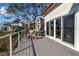 Relaxing deck with water views, seating, and access to interior at 6442 Mourning Dove Dr # 6442, Bradenton, FL 34210