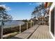 Spacious deck overlooking waterfront with seating area and grilling space at 6442 Mourning Dove Dr # 6442, Bradenton, FL 34210